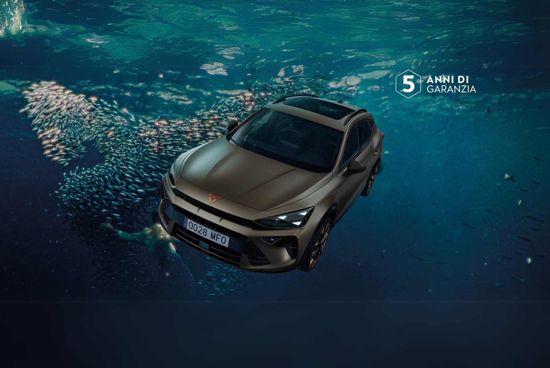 A three quarter front view of the new CUPRA Formentor 2024 car in motion, in the century bronze matt colour, with a blurred background.