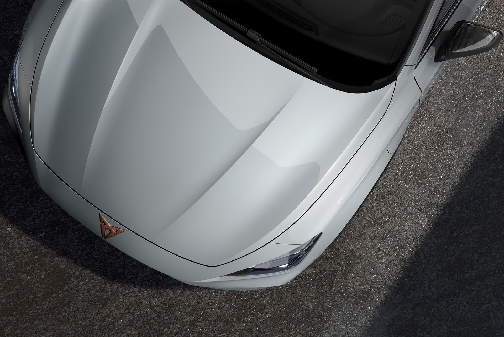 Upper shot of the front nose of the CUPRA Formentor in Glacial White with metallic finish.