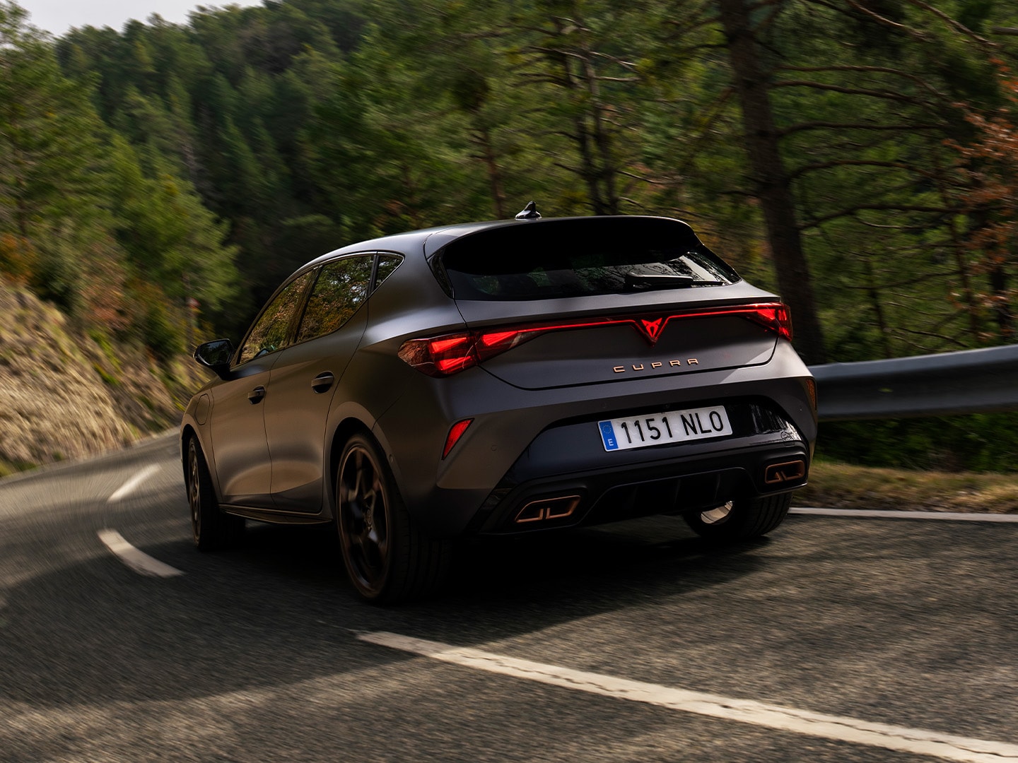 Upper rear-view of the CUPRA Leon, showcasing its exterior design lines.