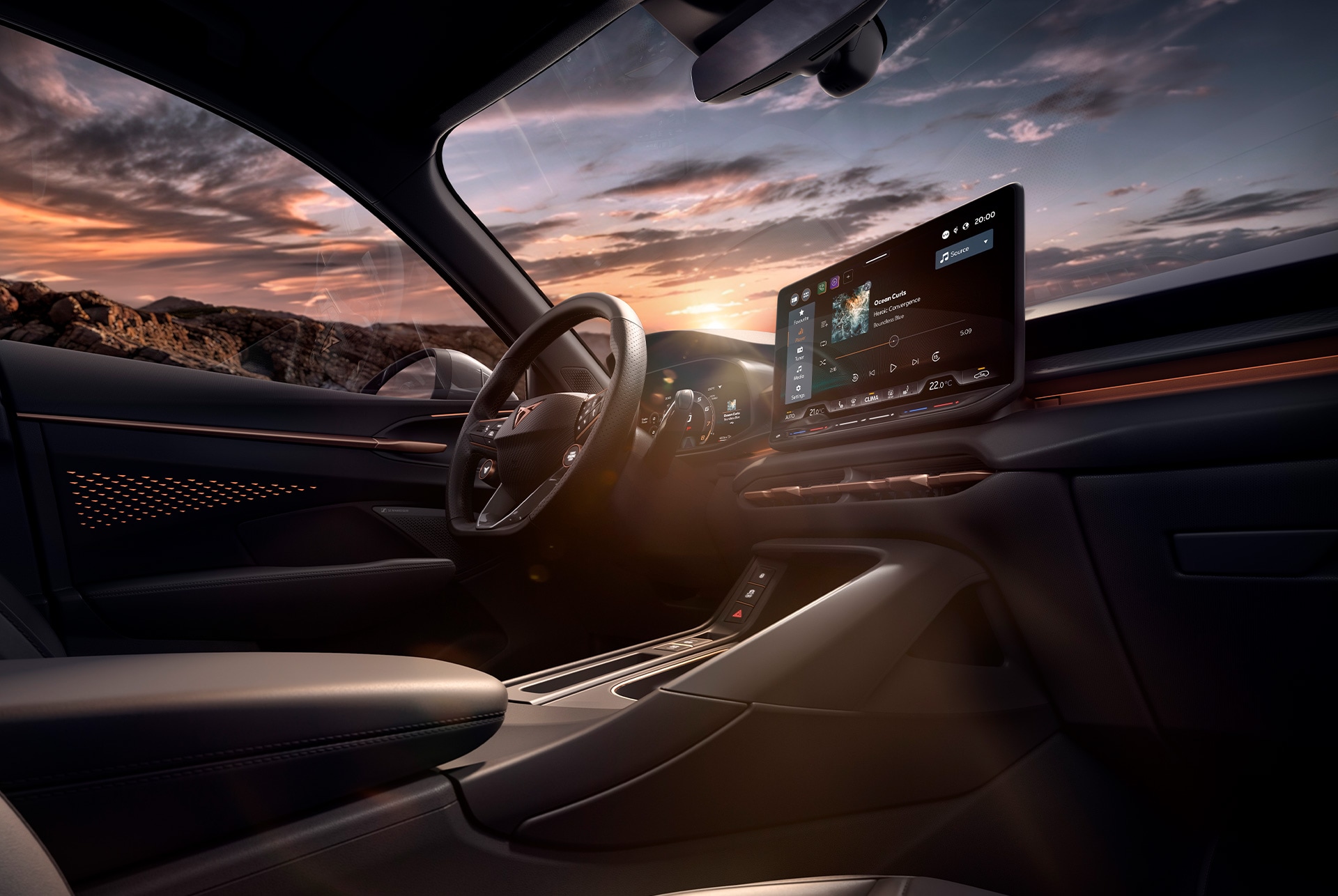 Intérieur de la nouvelle CUPRA Terramar VZ High Canyon avec système d’info-divertissement de 12.9 pouces, tableau de bord, volant avec palettes, touches et fonction de chauffage.