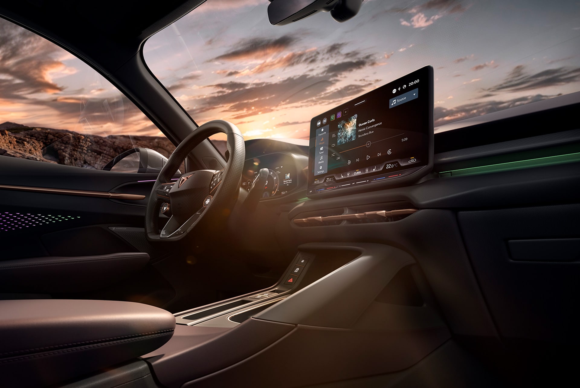 Intérieur de la nouvelle CUPRA Terramar équipé d’un système d’info-divertissement, d’un volant avec palettes et d’un tableau de bord aux accents cuivrés.